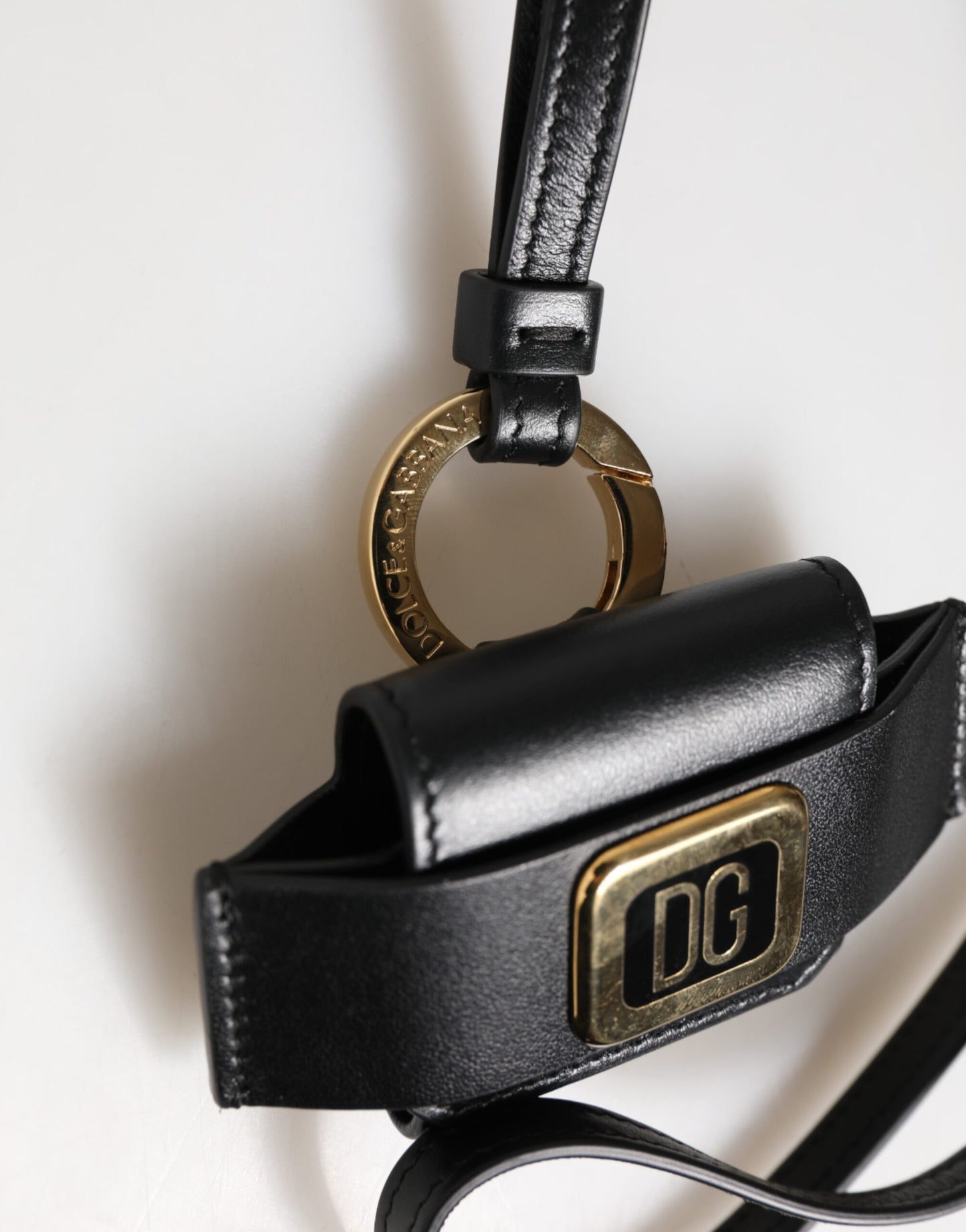 Dolce & Gabbana Black Leather Strap Gold Metal DG Logo Plaque Airpods Case